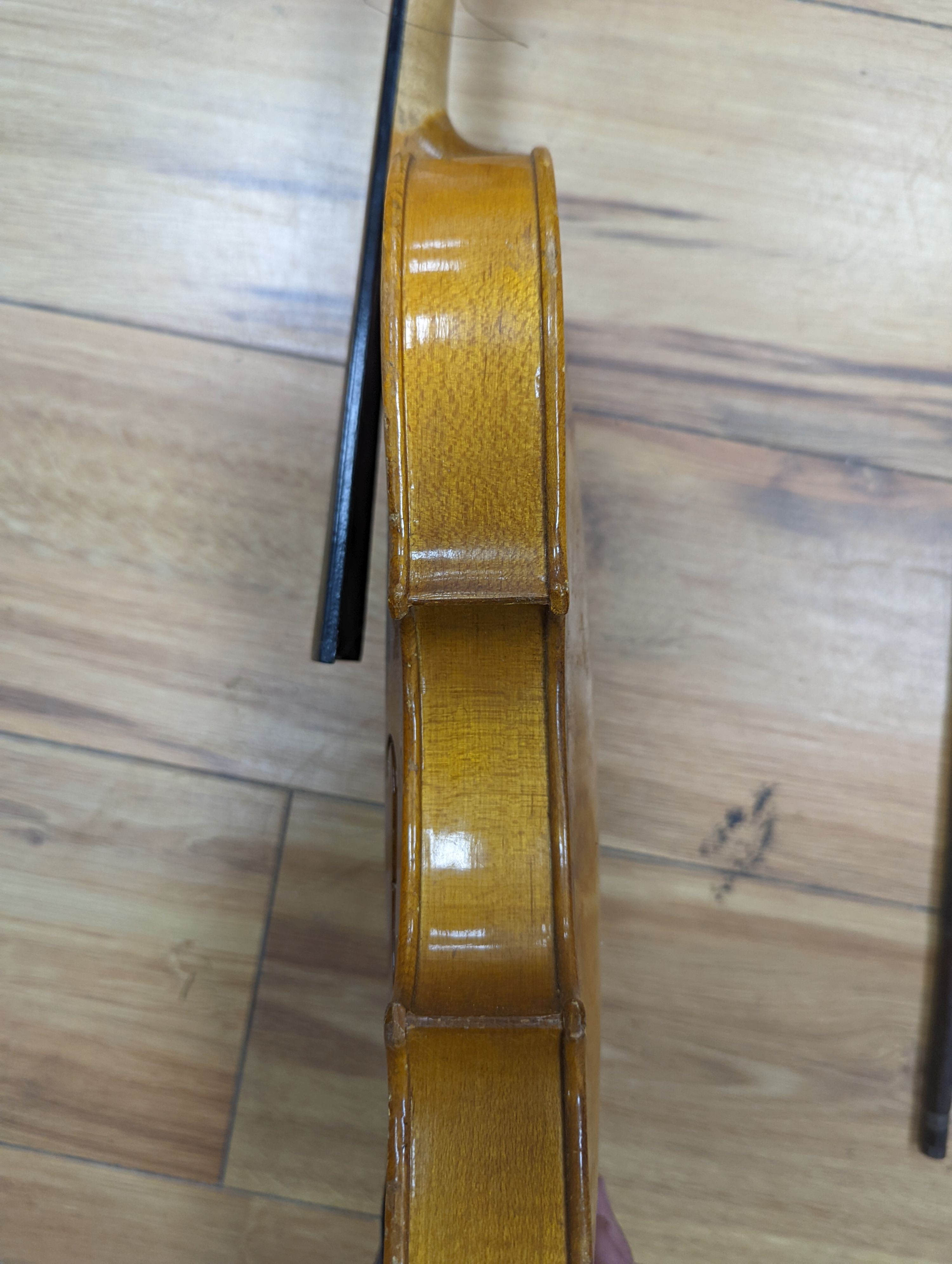 A violin and bow, various records etc